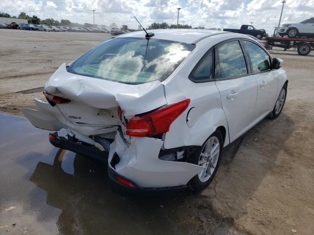 Photo 3 VIN: 1FADP3F29JL256392 - FORD FOCUS SE 