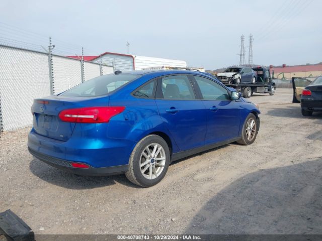 Photo 3 VIN: 1FADP3F29JL267411 - FORD FOCUS 