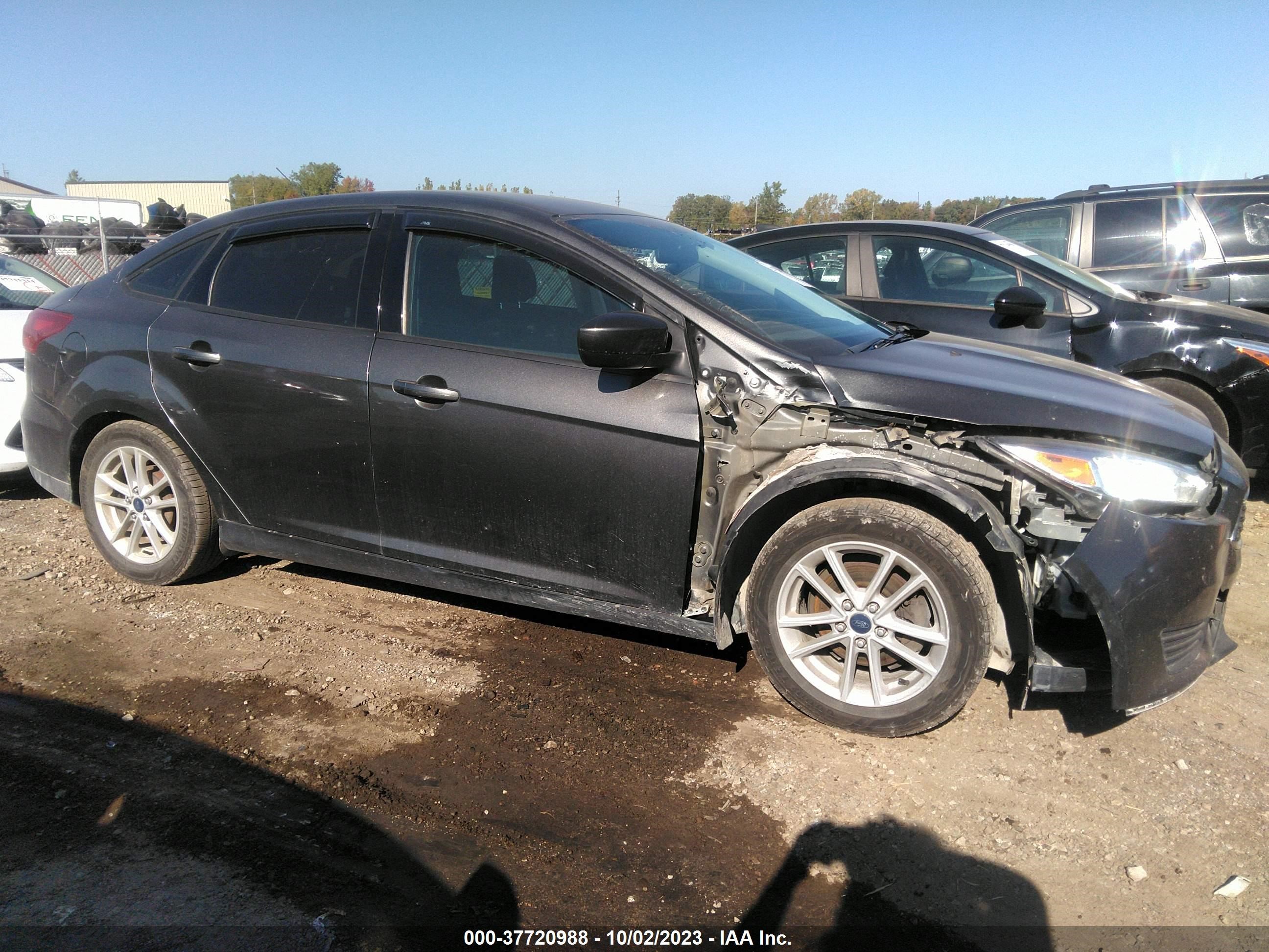 Photo 12 VIN: 1FADP3F29JL268414 - FORD FOCUS 