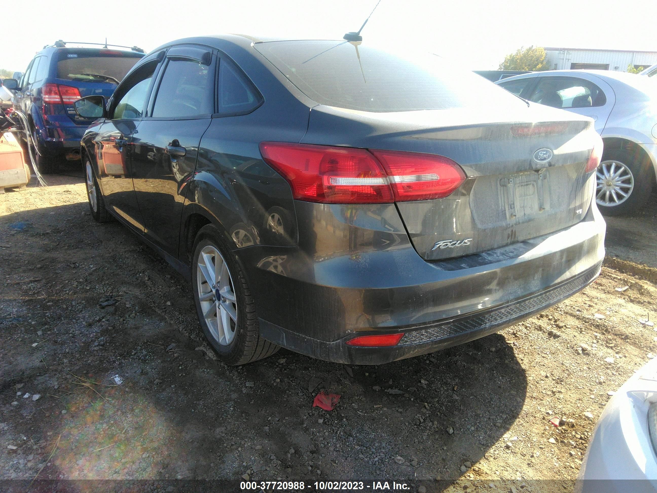 Photo 2 VIN: 1FADP3F29JL268414 - FORD FOCUS 