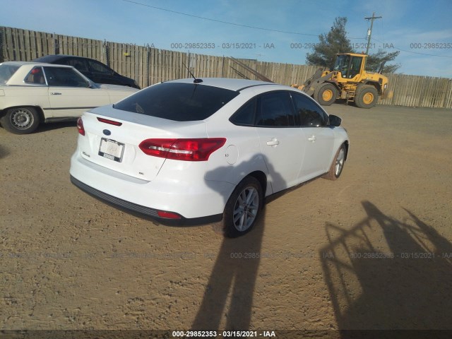 Photo 3 VIN: 1FADP3F29JL285231 - FORD FOCUS 