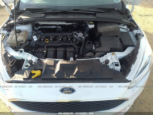 Photo 9 VIN: 1FADP3F29JL285231 - FORD FOCUS 