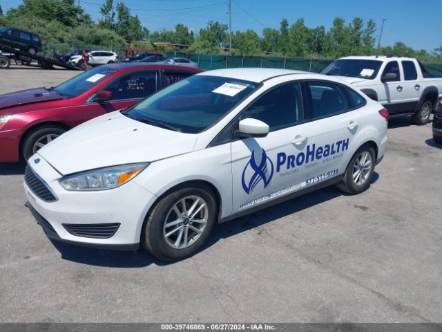 Photo 1 VIN: 1FADP3F29JL286055 - FORD FOCUS 