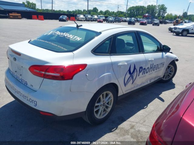 Photo 3 VIN: 1FADP3F29JL286055 - FORD FOCUS 