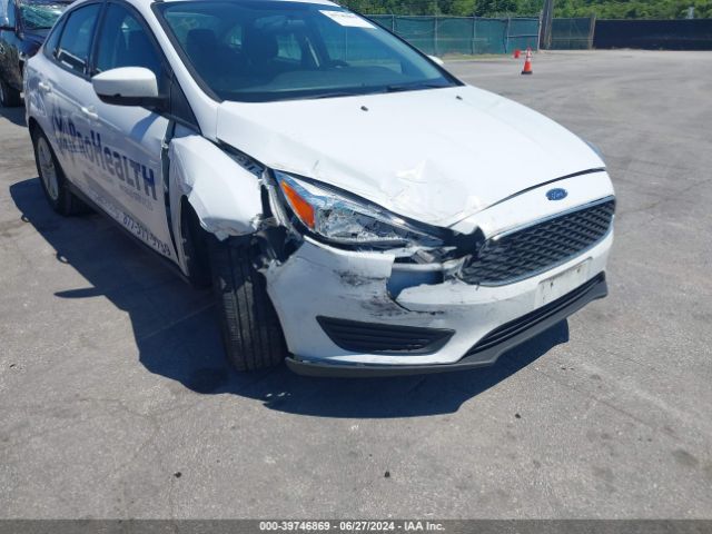 Photo 5 VIN: 1FADP3F29JL286055 - FORD FOCUS 