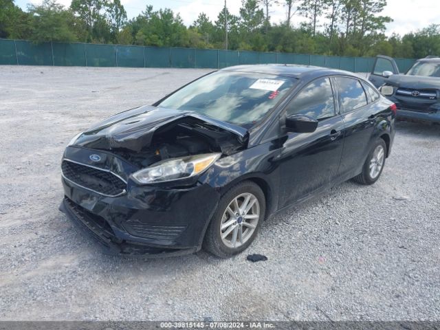 Photo 1 VIN: 1FADP3F29JL297475 - FORD FOCUS 