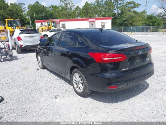 Photo 2 VIN: 1FADP3F29JL297475 - FORD FOCUS 