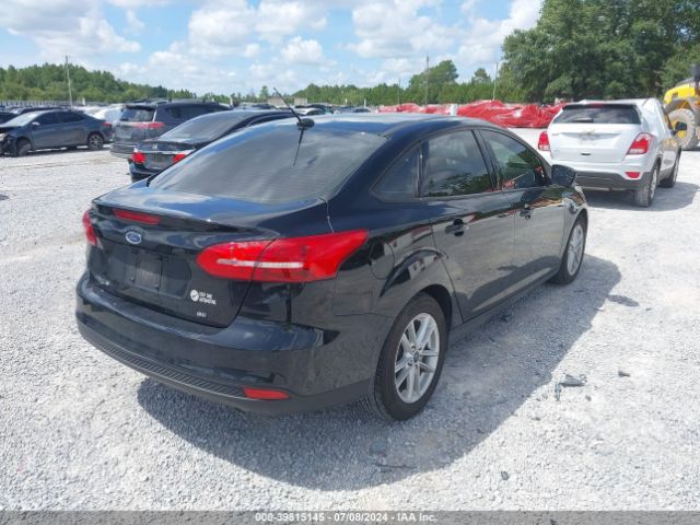 Photo 3 VIN: 1FADP3F29JL297475 - FORD FOCUS 