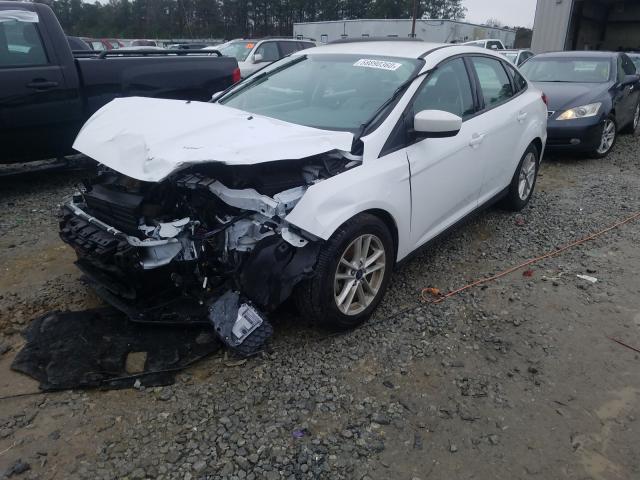 Photo 1 VIN: 1FADP3F29JL299064 - FORD FOCUS SE 