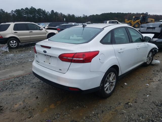 Photo 3 VIN: 1FADP3F29JL299064 - FORD FOCUS SE 