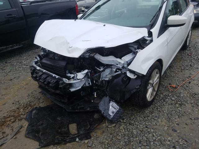 Photo 9 VIN: 1FADP3F29JL299064 - FORD FOCUS SE 