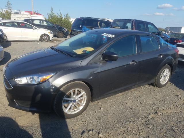 Photo 1 VIN: 1FADP3F29JL307129 - FORD FOCUS 