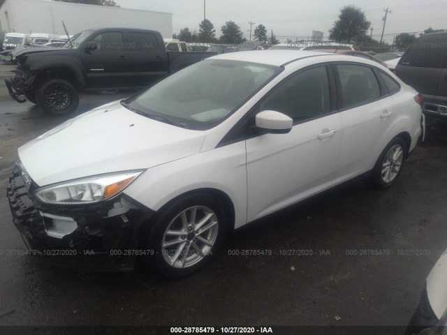 Photo 1 VIN: 1FADP3F29JL310600 - FORD FOCUS 