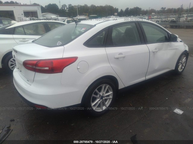 Photo 3 VIN: 1FADP3F29JL310600 - FORD FOCUS 