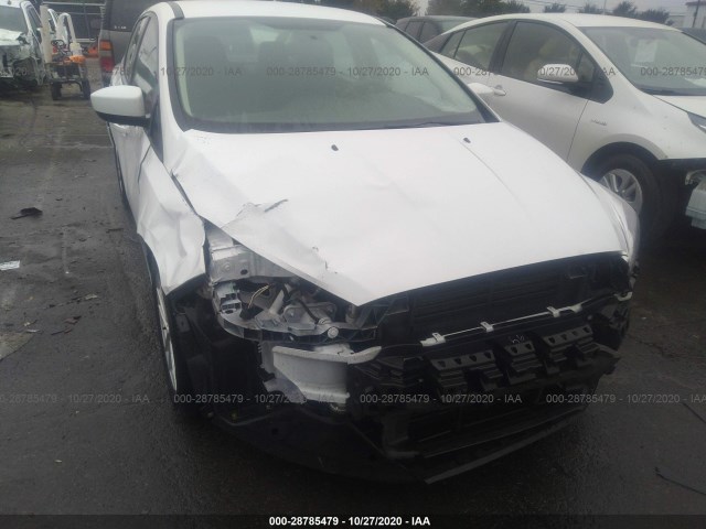 Photo 5 VIN: 1FADP3F29JL310600 - FORD FOCUS 