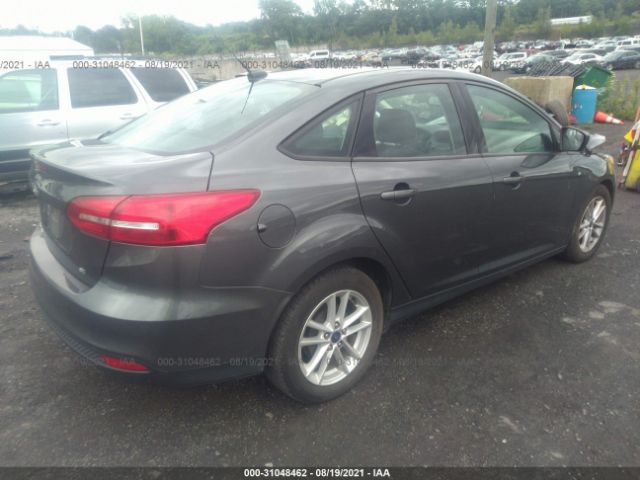 Photo 3 VIN: 1FADP3F29JL326277 - FORD FOCUS 