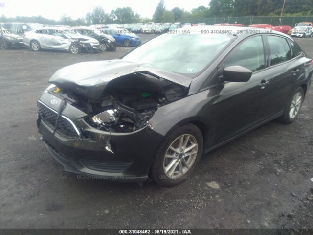 Photo 5 VIN: 1FADP3F29JL326277 - FORD FOCUS 