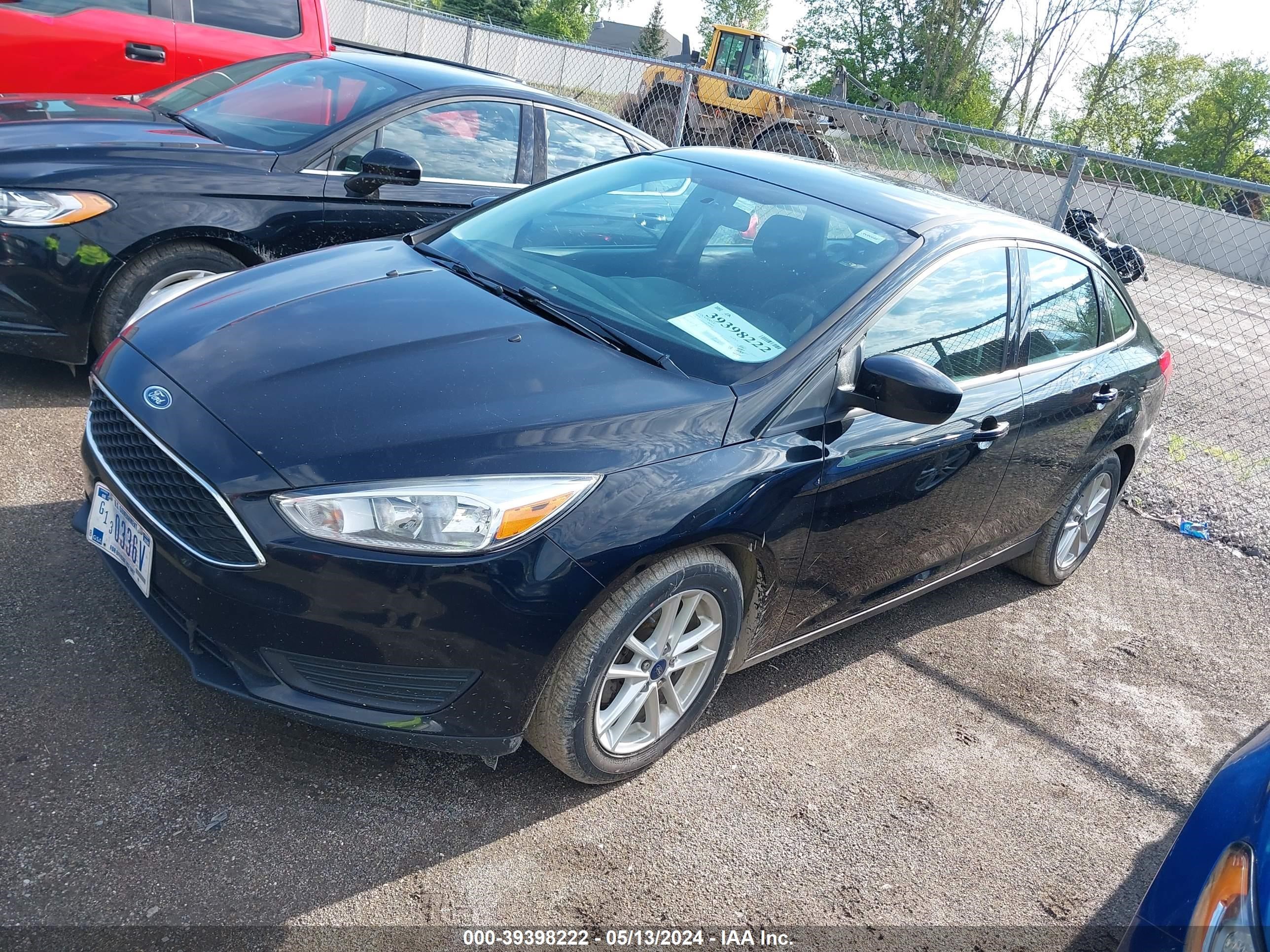 Photo 1 VIN: 1FADP3F2DJL328676 - FORD FOCUS 