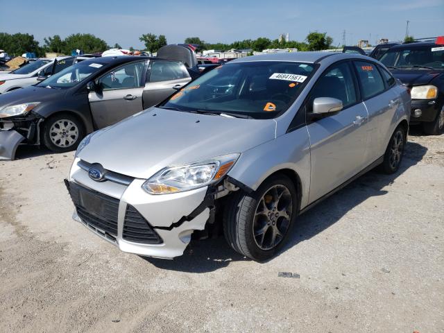 Photo 1 VIN: 1FADP3F2XDL171713 - FORD FOCUS SE 