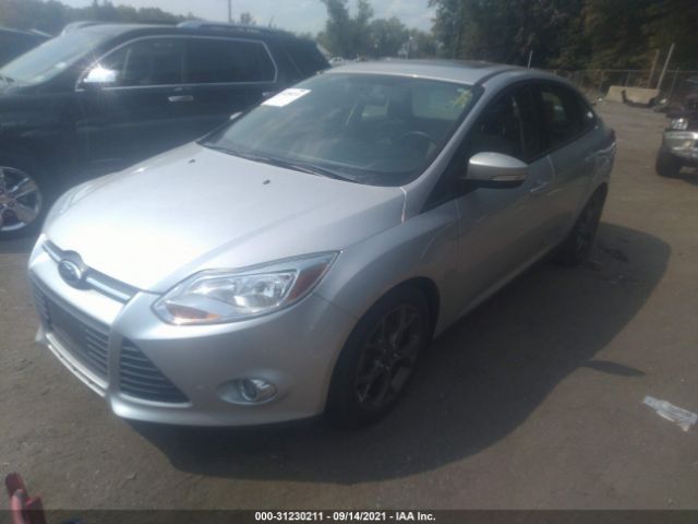 Photo 1 VIN: 1FADP3F2XDL320119 - FORD FOCUS 