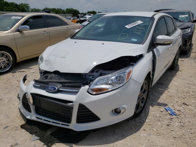 Photo 1 VIN: 1FADP3F2XDL336627 - FORD FOCUS SE 