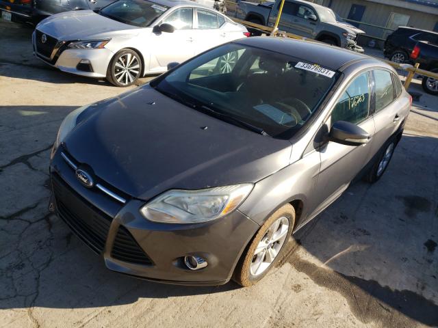 Photo 1 VIN: 1FADP3F2XDL355095 - FORD FOCUS SE 