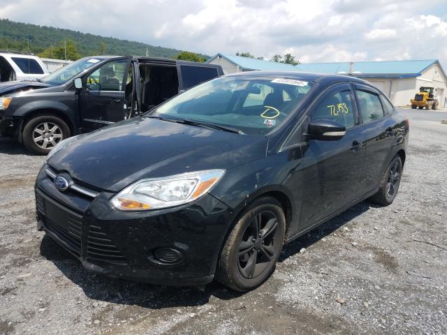 Photo 1 VIN: 1FADP3F2XDL358921 - FORD FOCUS 