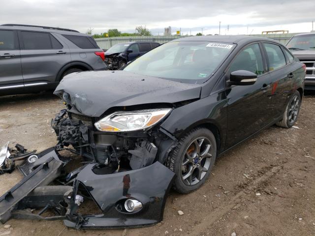 Photo 1 VIN: 1FADP3F2XDL373029 - FORD FOCUS SE 