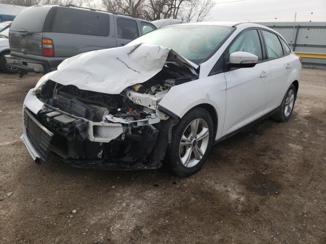 Photo 1 VIN: 1FADP3F2XDL382572 - FORD FOCUS SE 