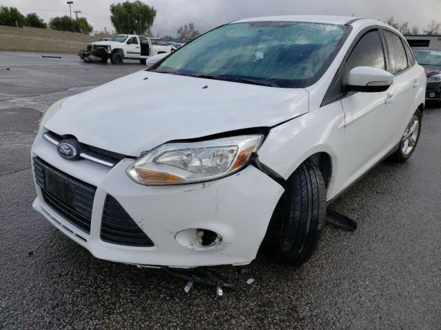 Photo 1 VIN: 1FADP3F2XEL110802 - FORD FOCUS SE 