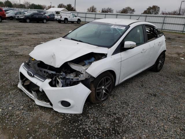 Photo 1 VIN: 1FADP3F2XEL162592 - FORD FOCUS SE 