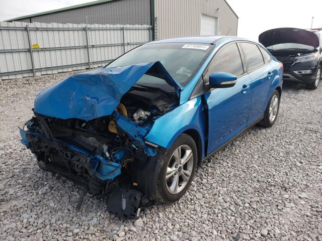 Photo 1 VIN: 1FADP3F2XEL243995 - FORD FOCUS SE 