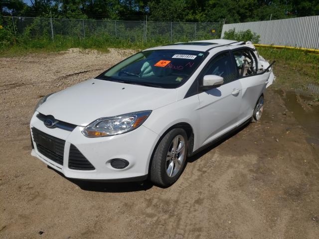 Photo 1 VIN: 1FADP3F2XEL277290 - FORD FOCUS SE 