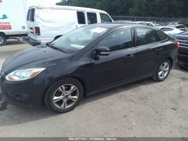 Photo 1 VIN: 1FADP3F2XEL310028 - FORD FOCUS 