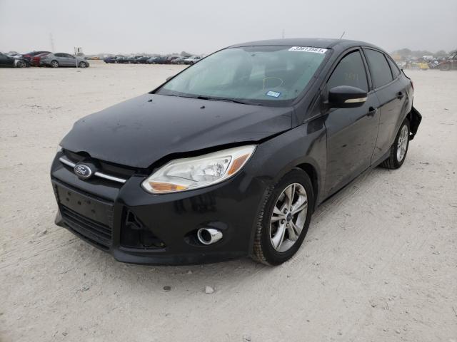 Photo 1 VIN: 1FADP3F2XEL311048 - FORD FOCUS SE 