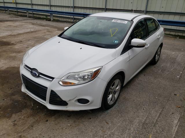 Photo 1 VIN: 1FADP3F2XEL411523 - FORD FOCUS SE 