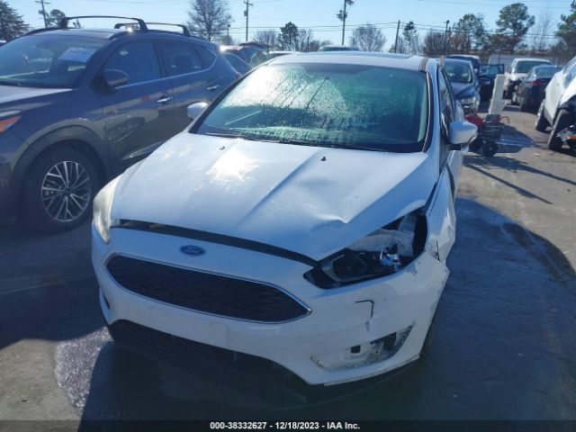 Photo 5 VIN: 1FADP3F2XFL205216 - FORD FOCUS 