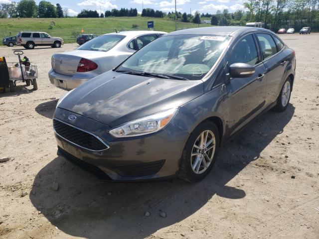 Photo 1 VIN: 1FADP3F2XFL207032 - FORD FOCUS SE 