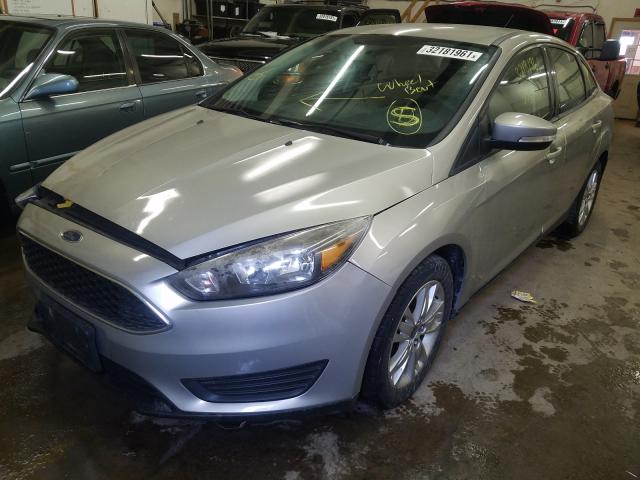 Photo 1 VIN: 1FADP3F2XFL220721 - FORD FOCUS SE 