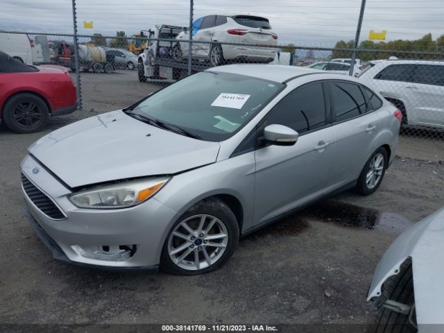 Photo 1 VIN: 1FADP3F2XFL249992 - FORD FOCUS 