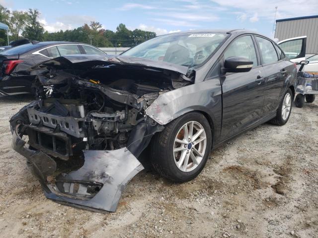 Photo 1 VIN: 1FADP3F2XFL252407 - FORD FOCUS SE 