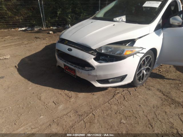 Photo 5 VIN: 1FADP3F2XFL252617 - FORD FOCUS 