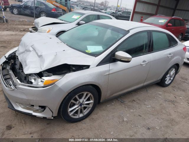 Photo 1 VIN: 1FADP3F2XFL256103 - FORD FOCUS 