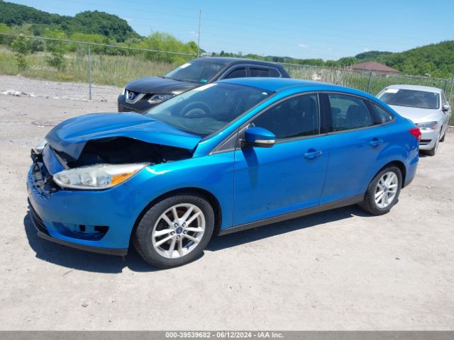 Photo 1 VIN: 1FADP3F2XFL260409 - FORD FOCUS 