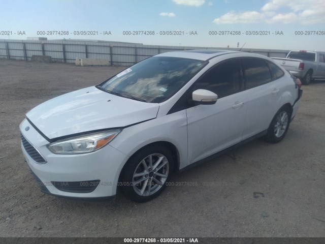 Photo 1 VIN: 1FADP3F2XFL262368 - FORD FOCUS 