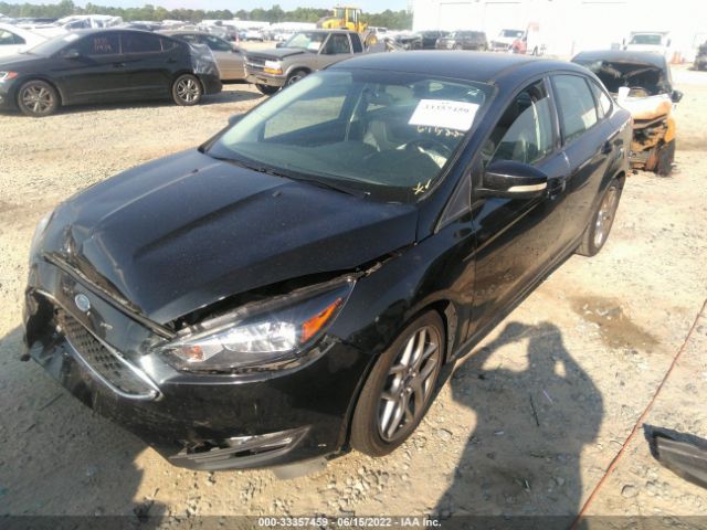 Photo 1 VIN: 1FADP3F2XFL264685 - FORD FOCUS 