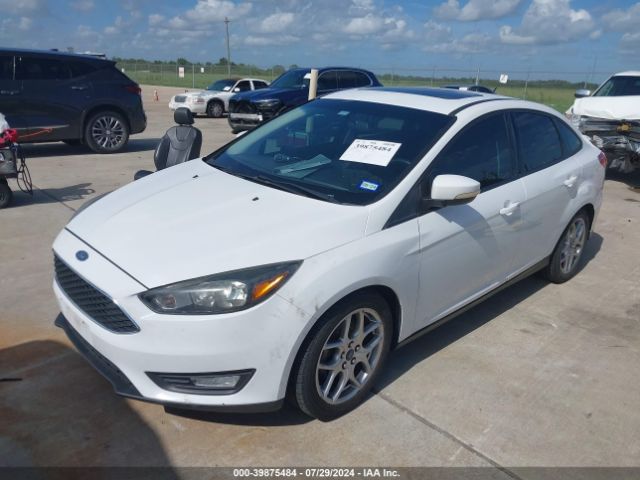 Photo 1 VIN: 1FADP3F2XFL268459 - FORD FOCUS 