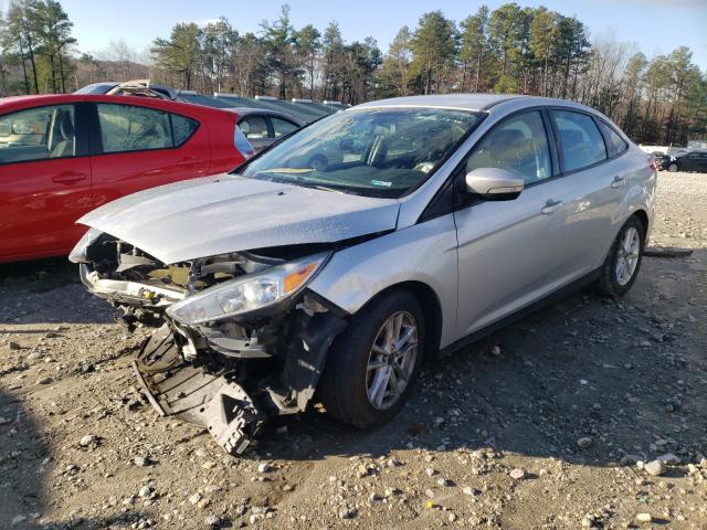 Photo 1 VIN: 1FADP3F2XFL279185 - FORD FOCUS SE 