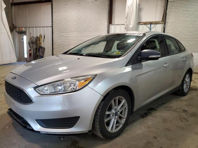 Photo 1 VIN: 1FADP3F2XFL282832 - FORD FOCUS SE 