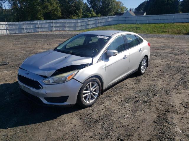 Photo 1 VIN: 1FADP3F2XFL289697 - FORD FOCUS 